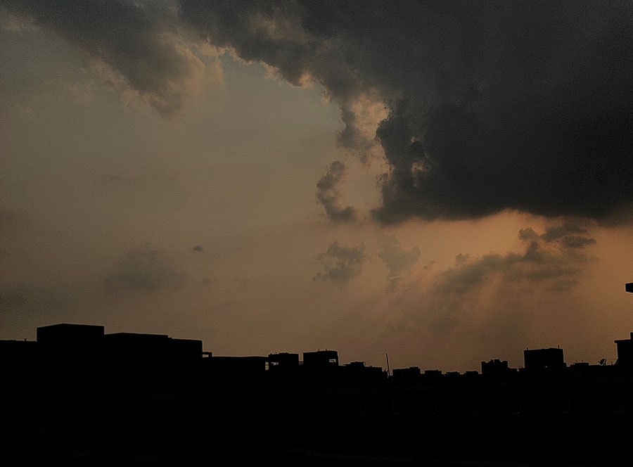 Dark clouds gather in the horizon in Kolkata on Tuesday afternoon