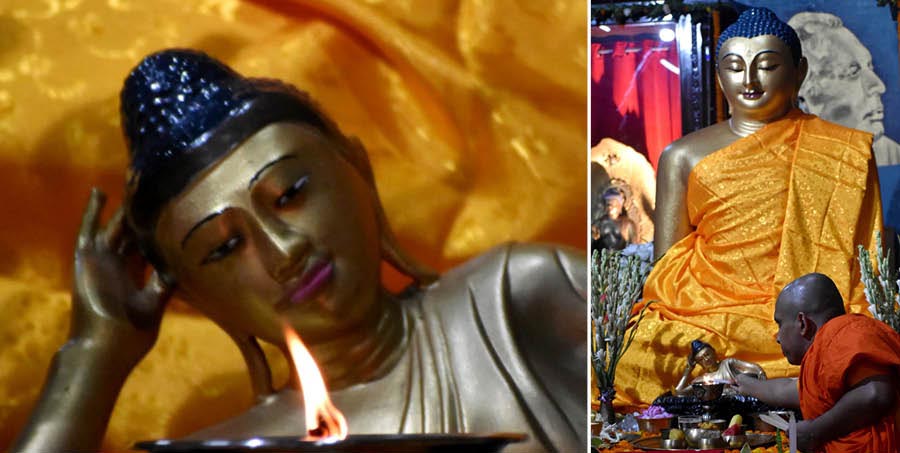 A priest prepares to worship a reclining idol of Lord Buddha at the Mahabodhi Society of India near College Square on Buddha Jayanti on Thursday 