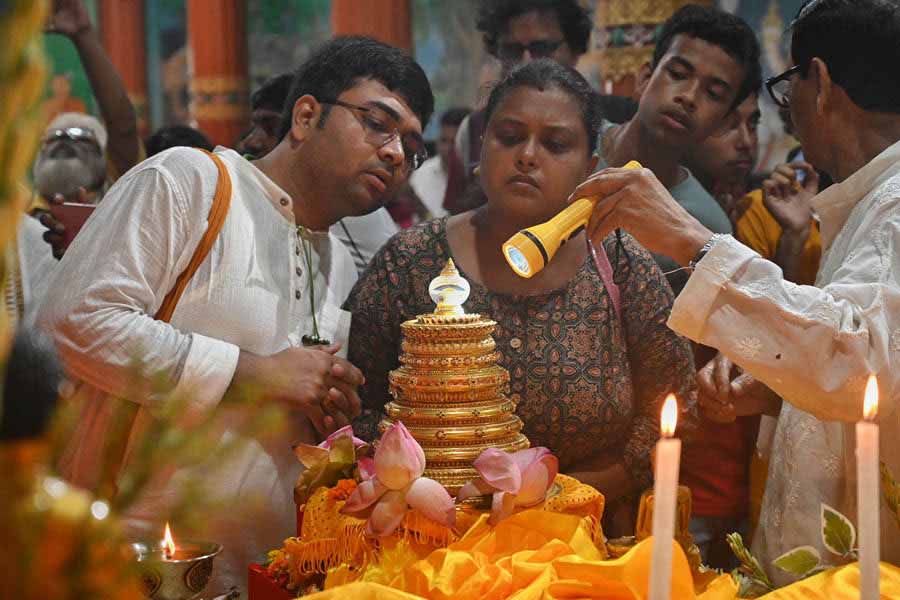 In pics: Devotion, prayers, candles and procession mark Buddha Jayanti celebrations from Dhakuria to Maidan and College Square