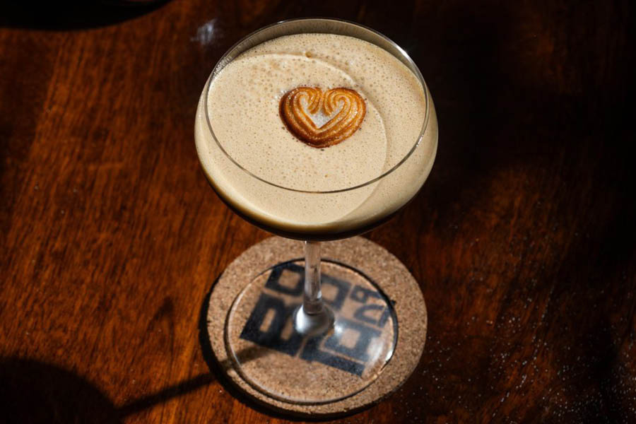 Nostalgic, available at Boo-Tang, blends vodka and cold brew coffee and is topped with a cute heart-shaped biscuit