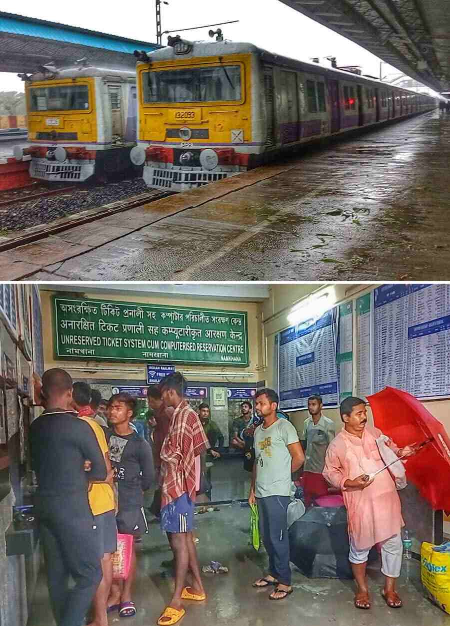 (Top) Trains remain stranded at Namkhana station on Monday morning and (above) passengers enquire about restoration of services at the station ticket counters