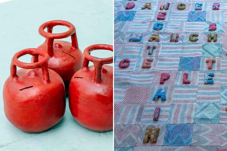LPG cylinders and their connect to the economic scenario of most and (right) a rug with random but crucial selection of words on a crossword pointing to the current political scenario