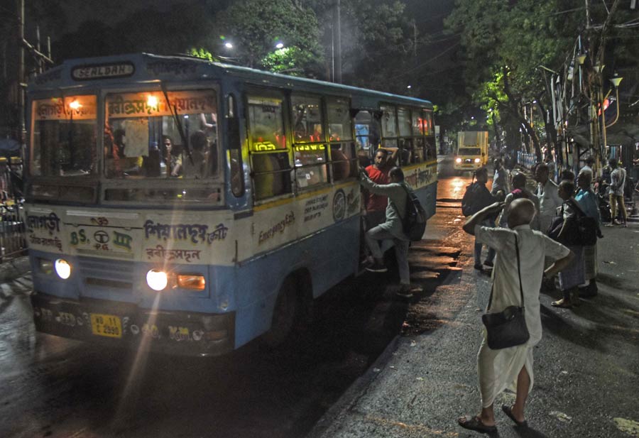 Office-goers who braved the rain and gusty wind, were seen returning. The public transport and roads were bustling again in Kolkata   