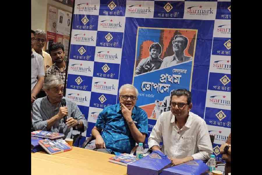 Sandip Ray makes a point as Siddhartha Chatterjee and Kushal Chakraborty look on