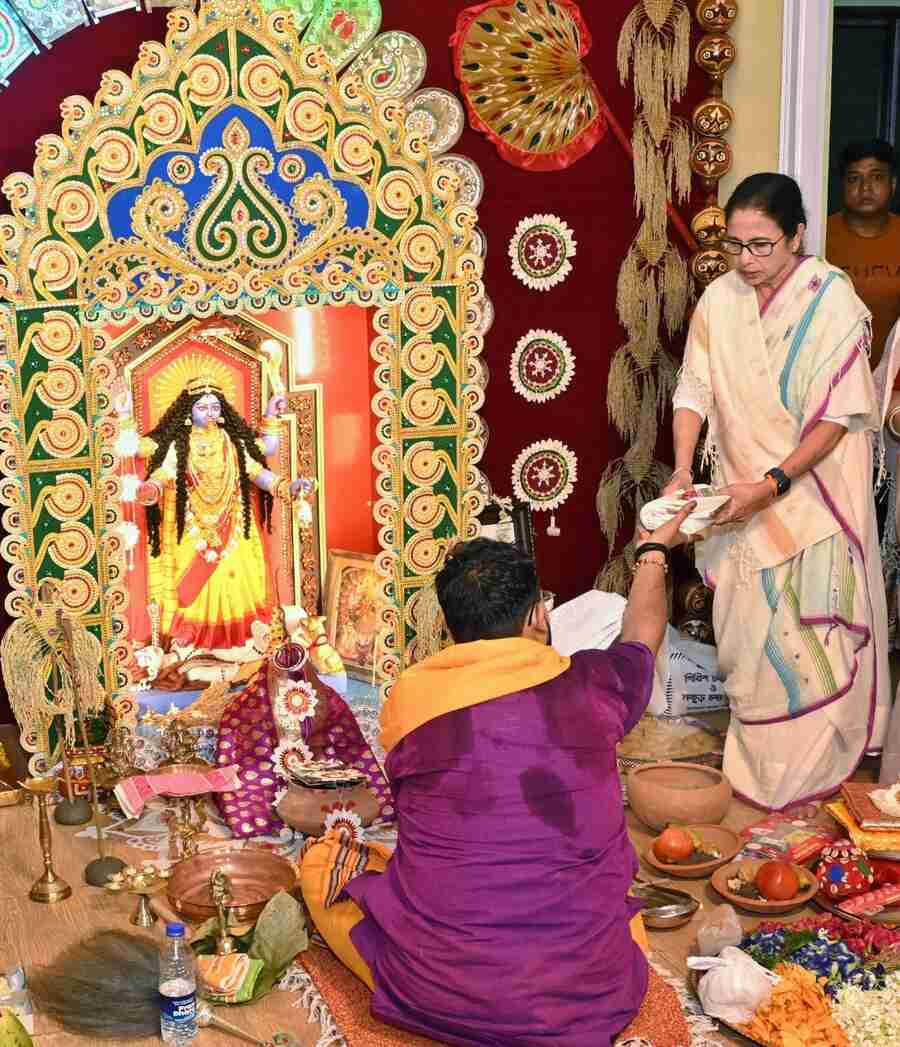 Chief minister Mamata Banerjee at the Kali puja at her home