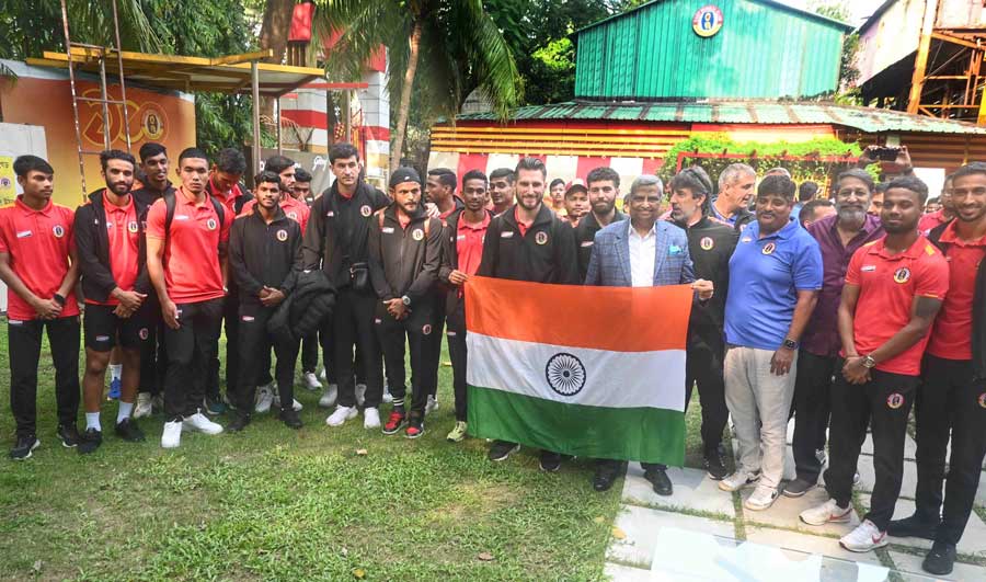East Bengal players pose at their Kolkata tent after returning from the AFC Challenge League as group champions 