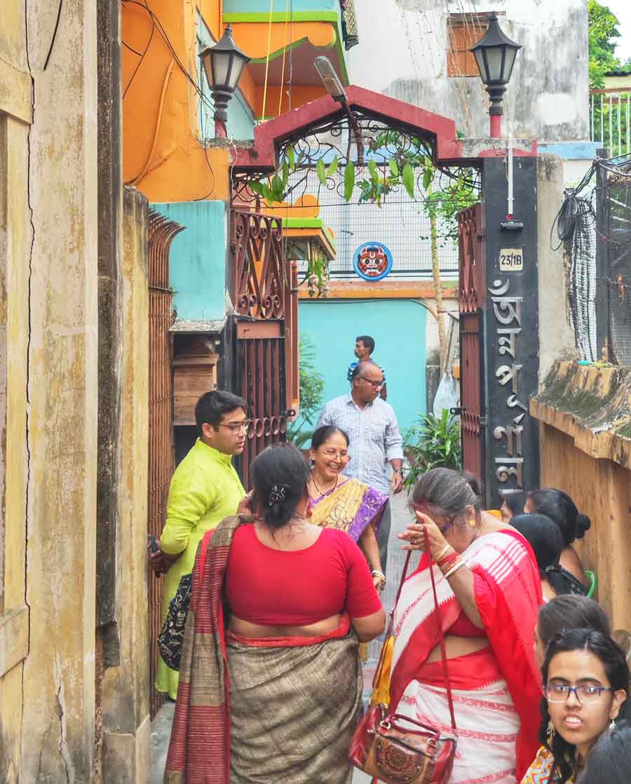 Devotees arrive at the Annakoot Puja at the Bhattacharya family home at Balaram Ghosh Street in north Kolkata on Saturday