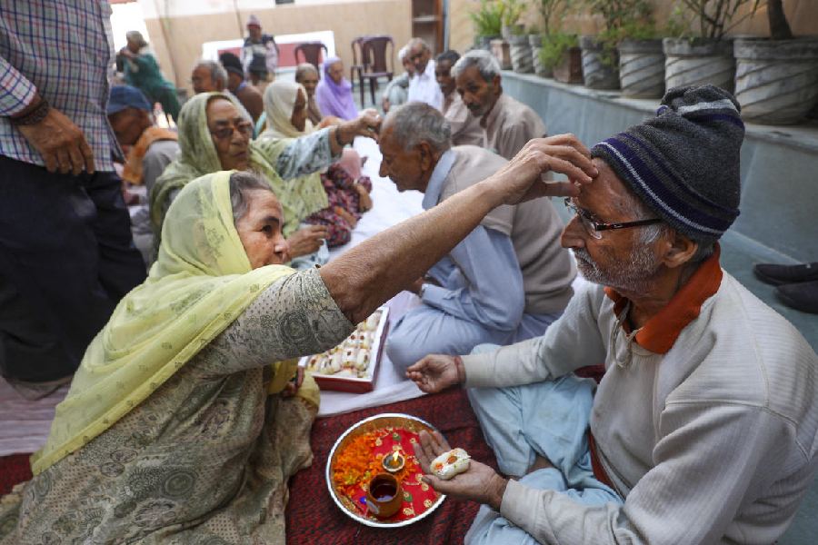 Bhai Dooj celebration at an Old Age Home, in Jammu. PTI