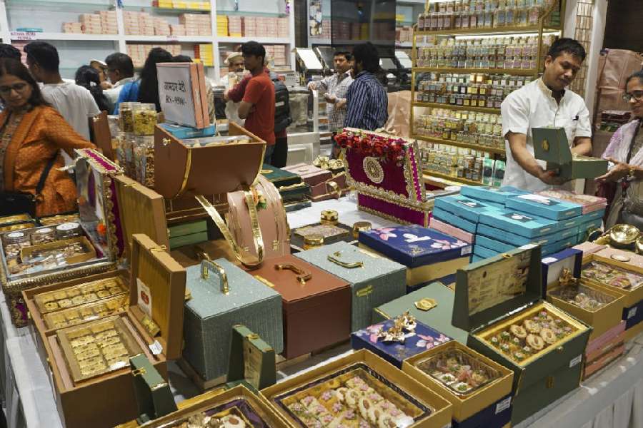 A sweet shop caters to customers' 'Bhai Dooj' special demands in Thane. PTI