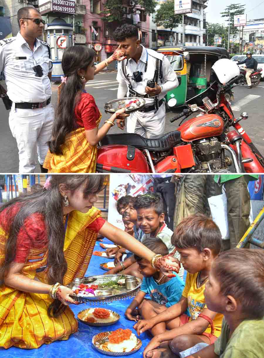 Members of the Medical Blood Bank in Maniktala put ‘tika’ on Kolkata Traffic Police and street children on the occasion of Bhai Phonta on Sunday  