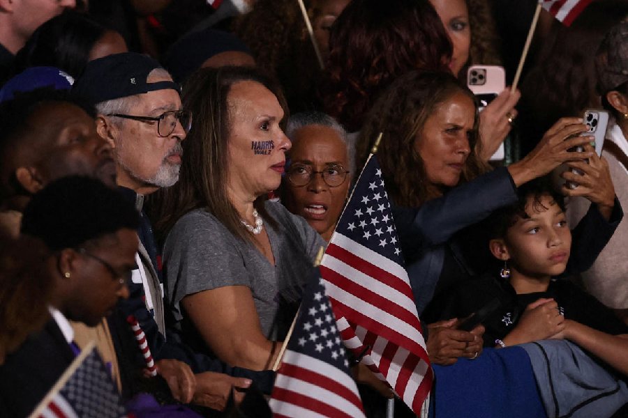 Attendees react during early election results at the event held by U.S. Democratic presidential nominee Kamala Harris during Election Night, at Howard University, in Washington, U.S., November 5, 2024.