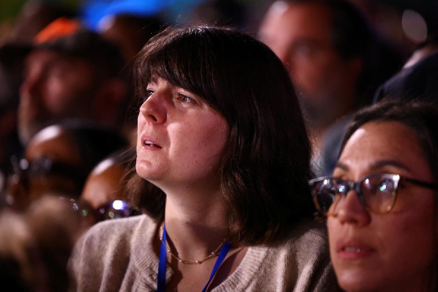 Supporters react to early election results at Democratic presidential nominee U.S. Vice President Kamala Harris' election night rally during the 2024 U.S. presidential election, at Howard University, in Washington, U.S., November 5, 2024.