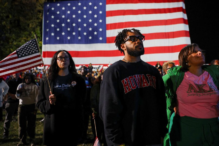 Attendees react to early election results at Democratic presidential nominee U.S. Vice President Kamala Harris' election night rally during the 2024 U.S. presidential election, at Howard University, in Washington, U.S., November 5, 2024.