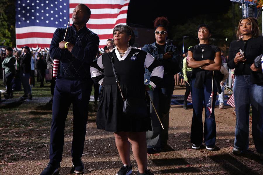 Attendees watch poll results during the Election Night rally for U.S. Democratic presidential nominee Kamala Harris, at Howard University, in Washington, U.S., November 5, 2024.