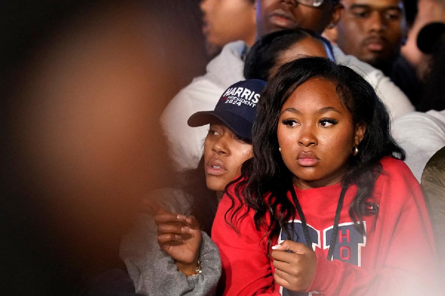 Supporters react while watching results during the Election Night rally for U.S. Democratic presidential nominee Kamala Harris, at Howard University, in Washington, U.S., November 5, 2024.