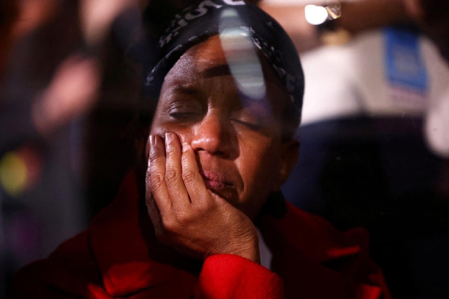 A supporter reacts to early election results at Democratic presidential nominee U.S. Vice President Kamala Harris' election night rally. Reuters