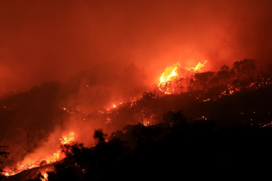 Smoke and flames billow from the Mountain Fire in Santa Paula, California, U.S. Reuters