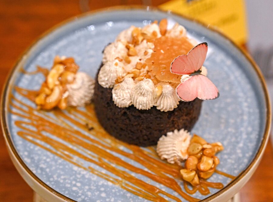 For those with a sweet tooth, the dessert selection features gluten-free and eggless delights like the Flourless Chocolate Cake, PB&J Story, and more