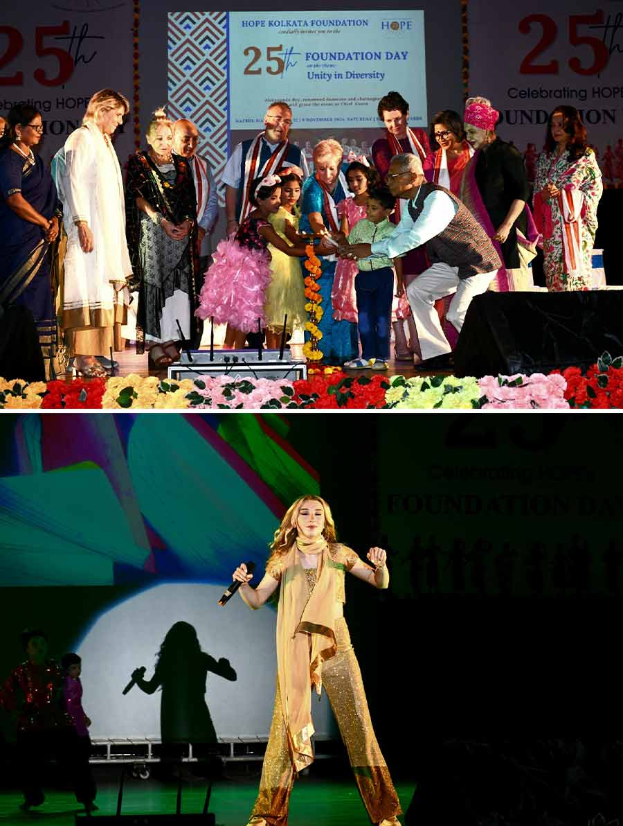 Children and a performer at the silver anniversary celebrations of Hope Foundation at Nazrul Manch on Saturday