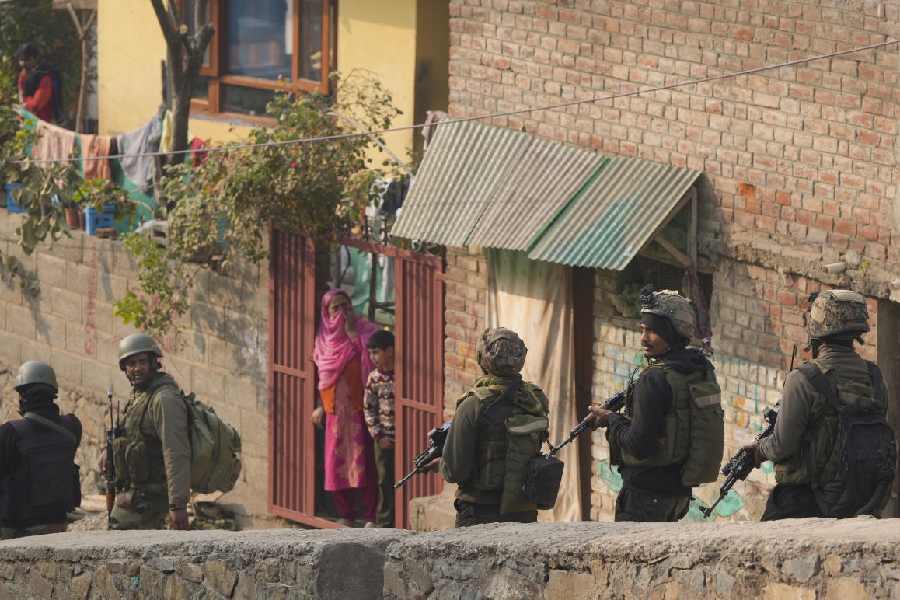 Security personnel during an encounter with terrorists at Zabarwan forest area on the outskirts of Srinagar