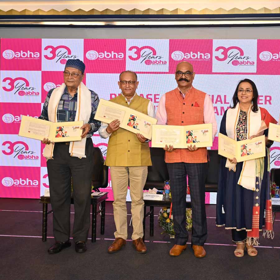 (L-R) Dr Basudeb Mukherjee, practising senior-most gynaecologist, associated with Ankuran IVF Clinic, Woodlands Hospital and Manipal Hospital; Dr Bani Kumar Mitra, founder and chief consultant, Abha Surgy Centre; Ashok Kumar, Postmaster General, Kolkata Region and Dr Konkon Das Mitra, director & chief embryologist; Abha Surgy Centre at the official Special Cover & My Stamp release ceremony of Abha Surgy Centre by India Post