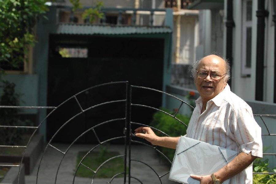 Manoj Mitra in front of his residence in AG Block.