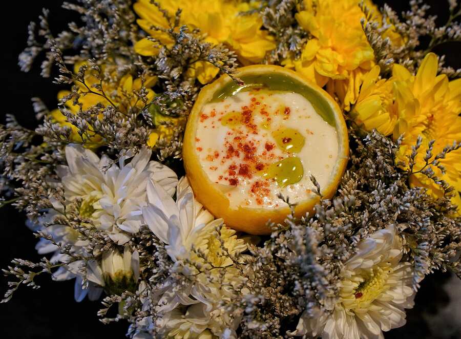 After the appetisers, a palate cleanser was served up. A take on Nimbu Saan, the Kumaoni winter raita-like dish made with bhaang chutney. Served in a hollowed-out Galgal lemon as a bowl, the yoghurt had a citrusy tang, and at the bottom was a pomelo surprise, adding a burst of sweet and sour