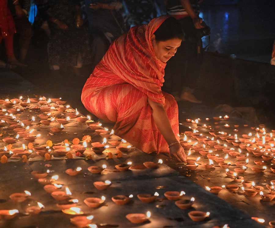 Thousands of lamps light up the Kolkata ghats for Dev Deepawali on Friday  