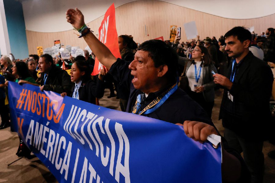 Environmental activists protest to urge world leaders to commit to a strong climate finance deal during the United Nations Climate Change Conference (COP29), in Baku, Azerbaijan November 16, 2024.