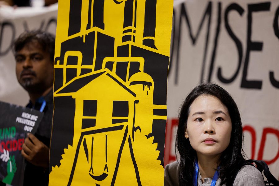 Environmental activists protest to urge world leaders to commit to a strong climate finance deal during the United Nations Climate Change Conference (COP29), in Baku, Azerbaijan November 16, 2024.