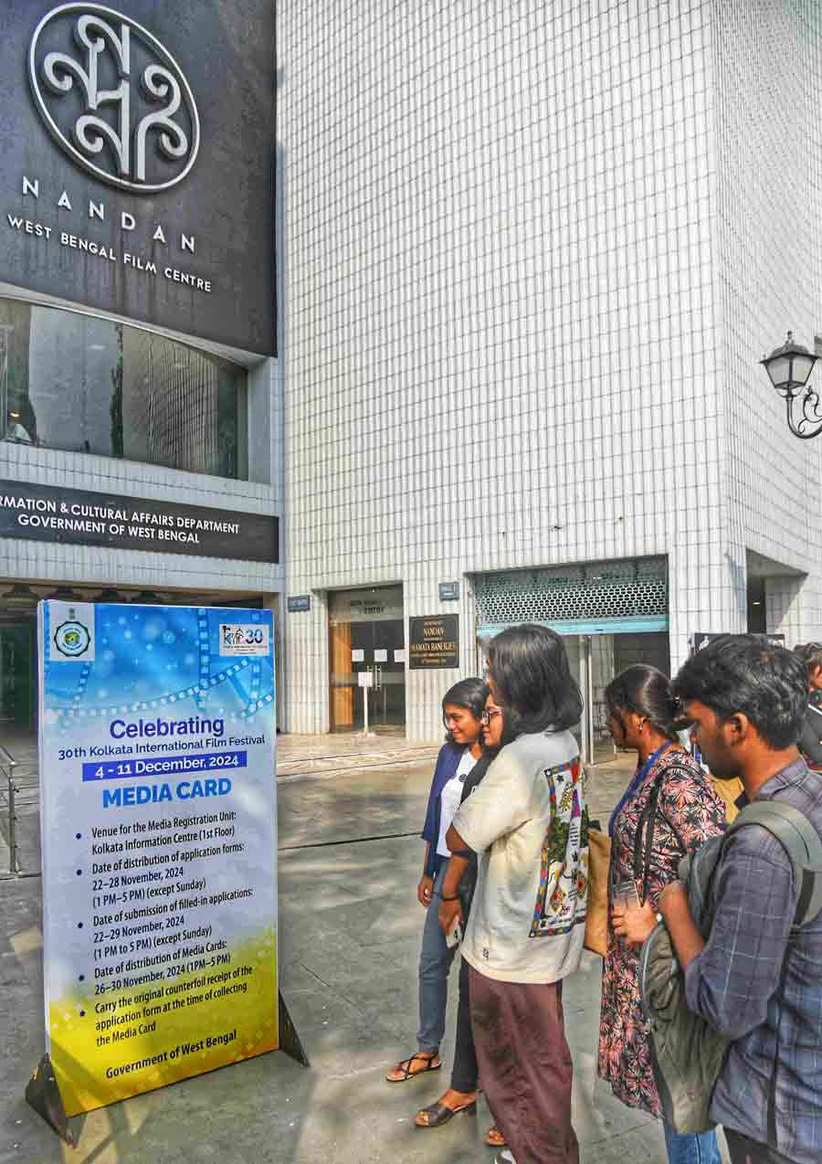 Film enthusiasts queue up at Nandan to collect media cards for the 30th Kolkata International Film Festival, which will be held from December 4 to 11  