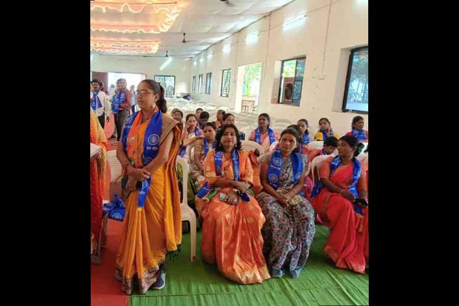 Madhubala Pramod Ukey (standing) along with other Dalit women supporting the BJP in Mahadula village under Kamthi constituency in Nagpur.