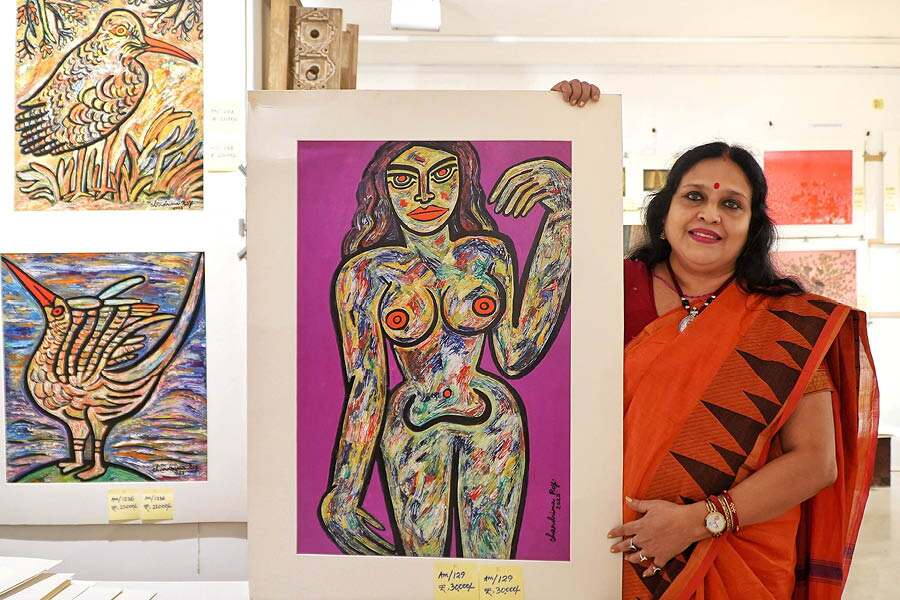 Chandrima Roy poses with her painting