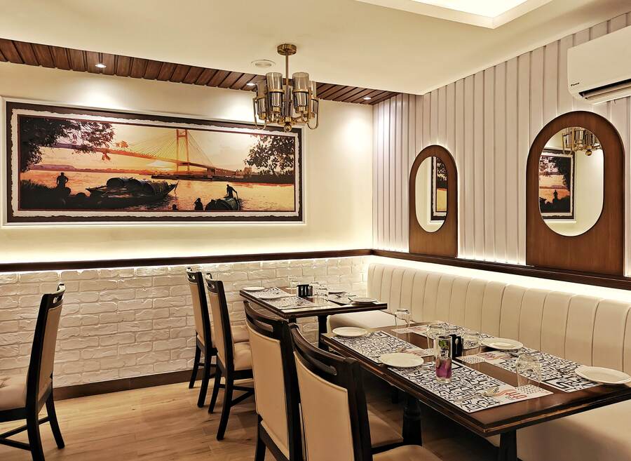 The interior of the two-storey restaurant is subtle and sophisticated, with shades of brown and beige, while the walls have framed photographs of iconic places in Kolkata. The 1,550 sq ft space can accommodate 62 covers, and is open every day from 12pm-4pm for lunch and 7pm-11pm for dinner