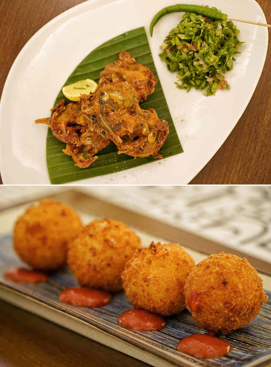 Up next on the starters were Mourala Machher Peyaji and Chingri Aranchini Balls. The ‘peyaji’, crispy on the outside and soft on the inside, had a generous amount of fish, while the Italian Arancini rice balls got a Bengali twist with aromatic Gobindobhog rice, and a creamy filling of  prawn and mozzarella cheese