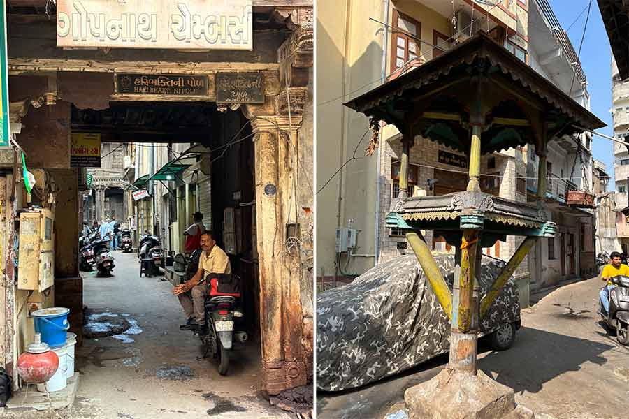 An old 'pol' gate and (right) a bird feeder in the central courtyard of a 'pol'