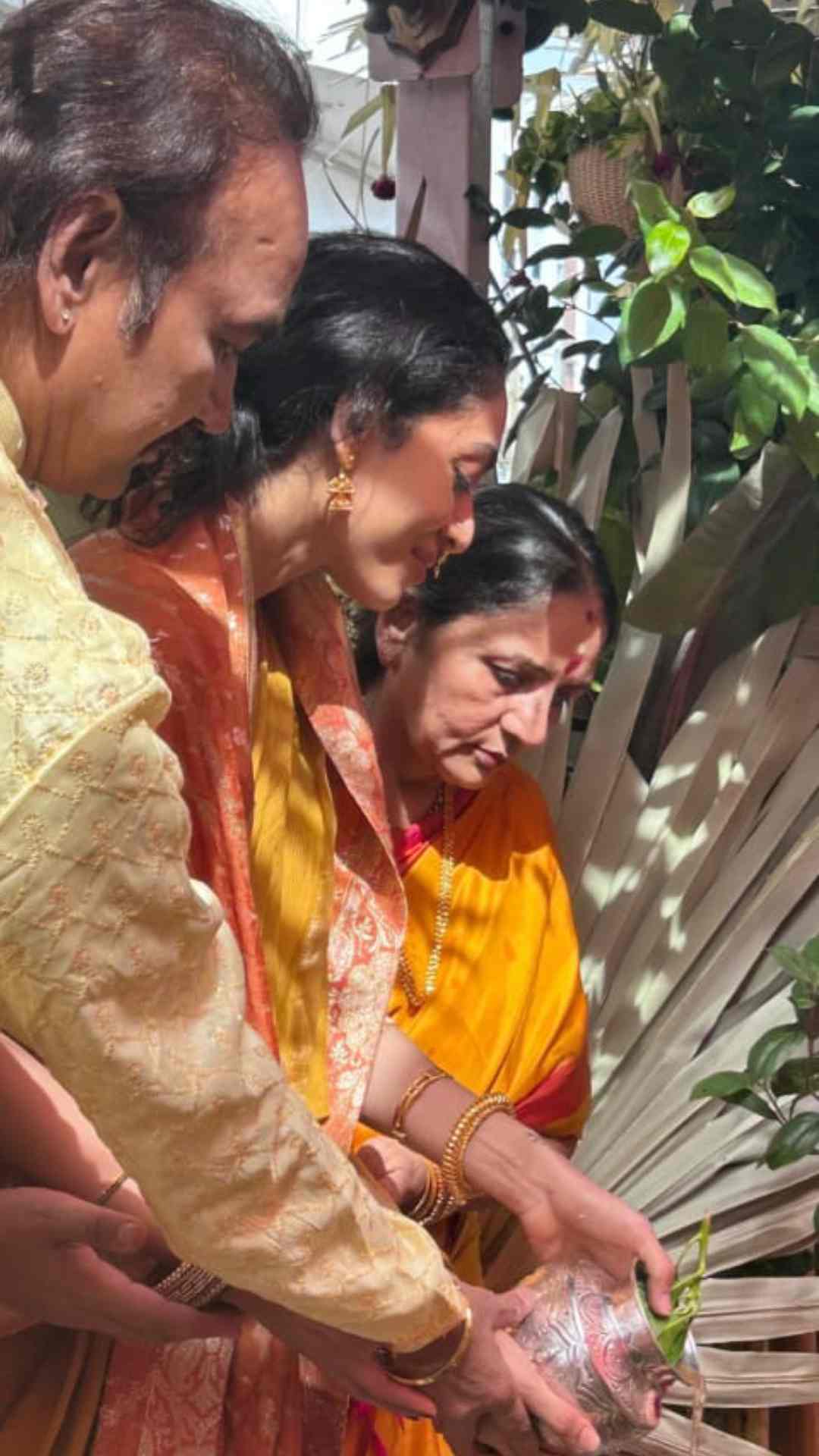 Wrapping her yellow ensemble with a red sari, the Made in Heaven actress beamed with joy as she took part in a pre-wedding ritual. 
