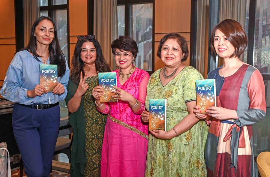 Well-wishers posed with the pair and Ipsita’s book of poems to show support