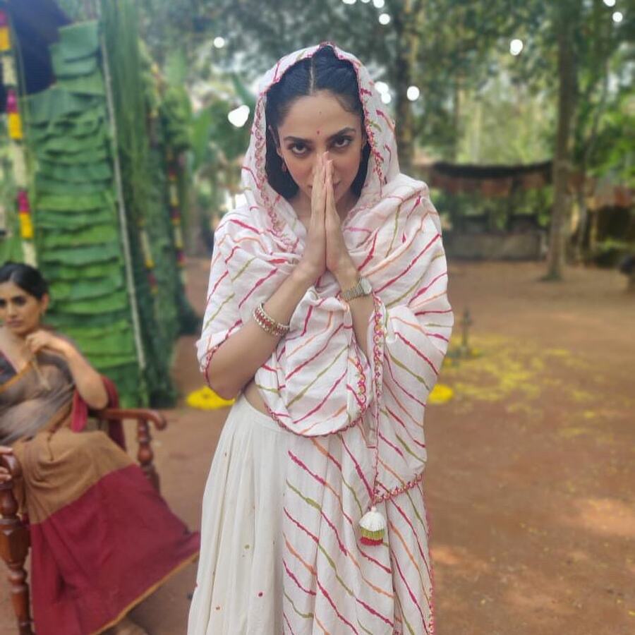 Sobhita, who recently got engaged to Naga Chaitanya, wore an outfit with pink and olive stripes. Braided hair and a red bindi completed her look.