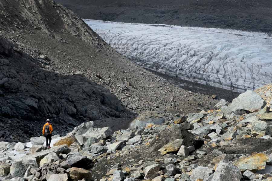 Glaciologist Huss walks down the Pers Glacier in Pontresina.