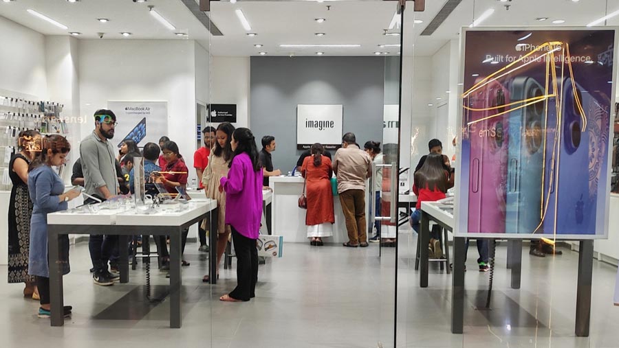 People throng Imagine stores to check out the newly launched iPhone 16