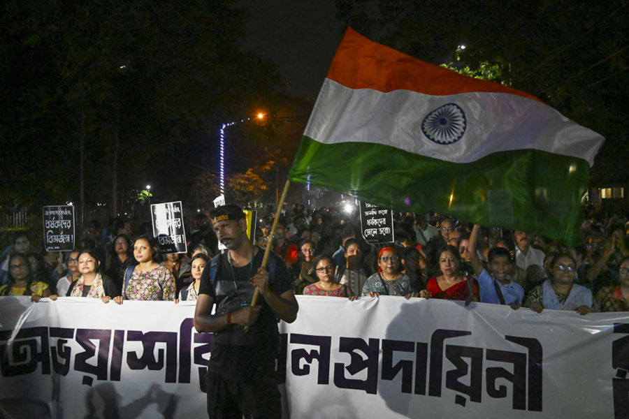 People take part in a protest rally under the banner of Joint Platform of Doctors in Calcutta.