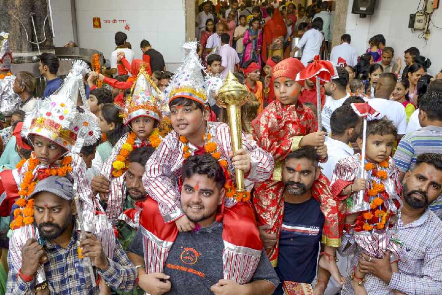 LITTLE LANGURS: At the Bada Hanuman Mandir’s Langur Mela in Amritsar, Thursday, October 3.  Parents bring children dressed as langurs to the temple for Navratri