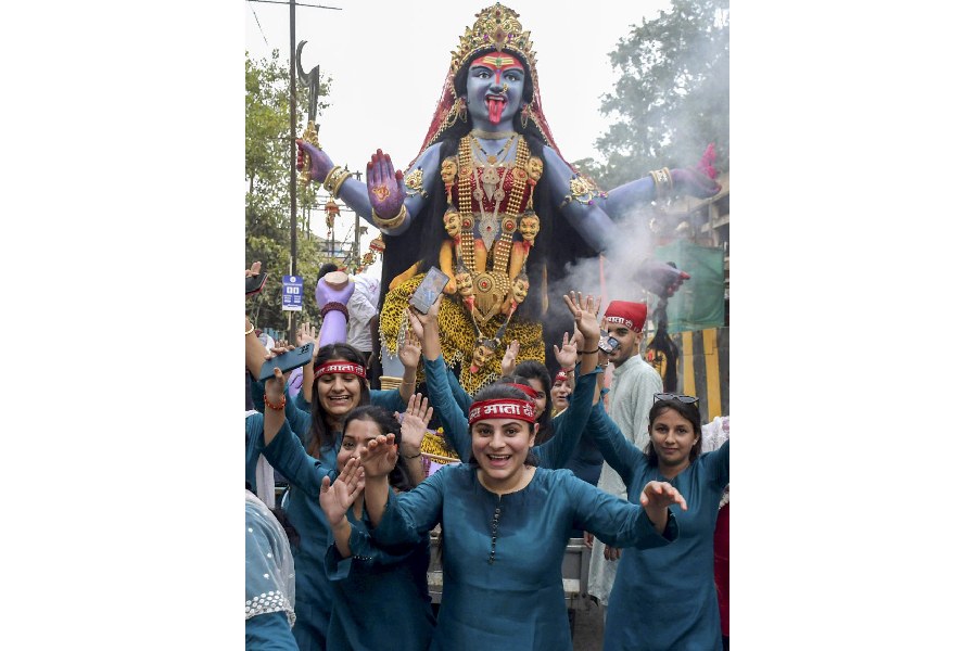 WOMEN POWER: An idol of Goddess Durga is taken to a pandal on the eve of Navratri in Nagpur, Wednesday, October 2