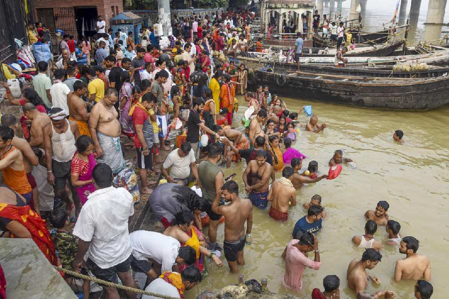 HOLY DIP: Devotees at a Ganga ghat in Patna on the first day of Navratri, Thursday, October 3