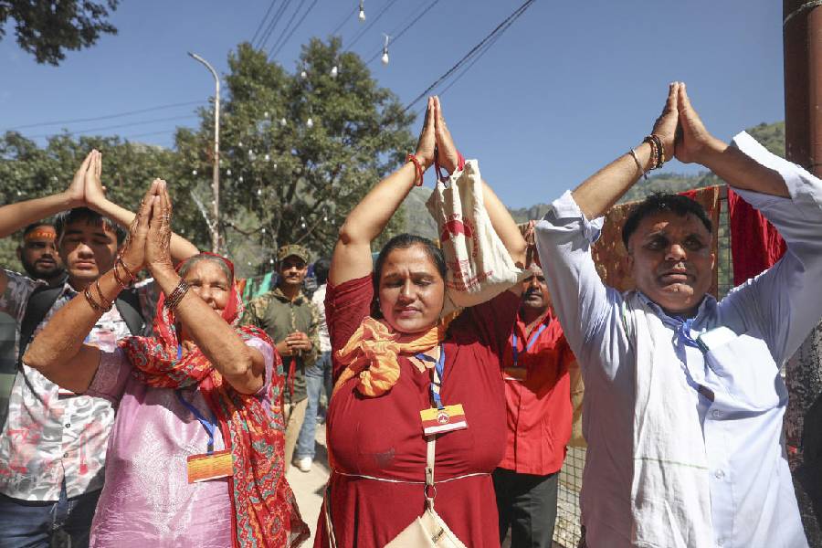 PEACE OF MIND: Devotees in Reasi district remain absorbed in prayers at the Mata Vaishno Devi shrine Thursday, Oct. 3, 2024 