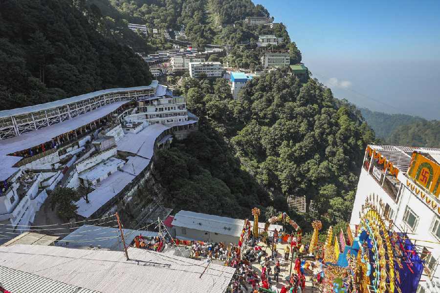 SPRITUAL GATHERING: Devotees in Reasi district march towards the Mata Vaishno Devi shrine, Thursday, Oct. 3