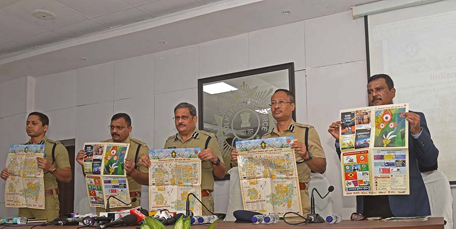 Joint commissioner of Kolkata Traffic Police Rupesh Kumar, deputy commissioner of Kolkata Traffic Police Yeilwad Shrikant Jagannathrao, Kolkata police commissioner Monoj Kumar Verma, additional commissioner of Kolkata police Subhankar Sinha Sarkar and LKS Chouhan of Indian Oil launch the Kolkata Police Puja Guide 2024 at Lalbazar on Friday. They also launched identity badges for children and the Kolkata Traffic Police Annual Review 2023 at the event