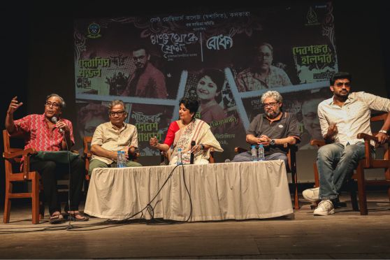 The star-studded panel discussion on the theme 'Mancha Theke Frame' featured a line-up of celebrated personalities, including Debesh Chattopadhyay, Shantilal Mukherjee, Debshankar Haldar, and Debashish Mandal, with Rini Biswas moderating the session. 