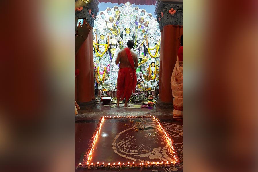 The 108 lamps during Sandhi Puja at the Ranaghat Pal family residence are arranged in a rectangular shape